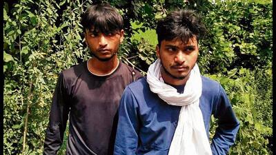 Two shooters of Davinder Bambiha gang who were arrested by the police in Moga on Tuesday. (HT photo) Two shooters of Davinder Bambiha gang who were arrested by the police in Moga on Tuesday. (HT photo)