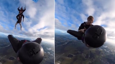 The image shows a woman preparing to jump on the back of another skydiver mid-air. (Facebook/@Insta360)