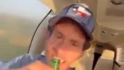 Garon Maia videoed himself swigging a beer while his son flew his plane. Garon Maia videoed himself swigging a beer while his son flew his plane.