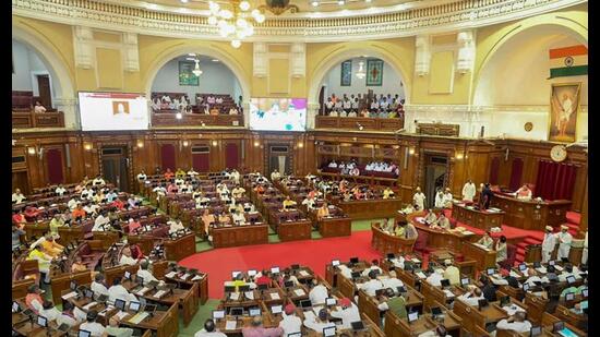 Members attend the Monsoon session of the UP Assembly, at Vidhan Bhawan, in Lucknow, Tuesday. (PTI Photo)