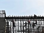 Labourers at work in Delhi's Sarai Kale Khan.