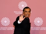 FILE PHOTO: Mukesh Ambani, Chairman of Reliance Industries, waves on the red carpet during the second day of the opening of Nita Mukesh Ambani Cultural Centre (NMACC) at Jio World Centre, in Mumbai, India, April 1, 2023. REUTERS/Niharika Kulkarni/File Photo