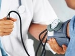 Picture of a doctor examining a patient.