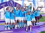 Manchester City players celebrate their Premier League title after the English Premier League match between Manchester City and Chelsea at the Etihad Stadium Manchester City players celebrate their Premier League title after the English Premier League match between Manchester City and Chelsea at the Etihad Stadium