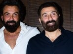 Bobby Deol and Sunny Deol pose together. Bobby Deol and Sunny Deol pose together.