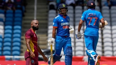 West Indies' bowler Yannic Cariah watches India's batsmen Shubman Gill and Ishan Kishan building up their partnership (AP) West Indies' bowler Yannic Cariah watches India's batsmen Shubman Gill and Ishan Kishan building up their partnership (AP)