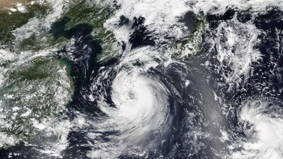 Satellite image released by NASA on Tuesday shows Tropical Storm Khanun, looming over Japan's southwestern islands. Khanun has taken an unusual, meandering path around Japan's southwestern islands for more than a week, dumping heavy rain, knocking out power to thousands of homes and disrupting flights and train services. (NASA Worldview, Earth Observing System Data and Information System) (AP) Satellite image released by NASA on Tuesday shows Tropical Storm Khanun, looming over Japan's southwestern islands. Khanun has taken an unusual, meandering path around Japan's southwestern islands for more than a week, dumping heavy rain, knocking out power to thousands of homes and disrupting flights and train services. (NASA Worldview, Earth Observing System Data and Information System) (AP)