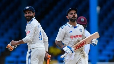 Ravindra Jadeja (L) and Virat Kohli (R), of India (AFP)