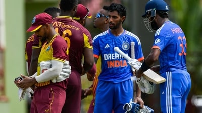 Tilak Varma and Hardik Pandya acknowledge West Indies after guiding India to a 7-wicket win. (AFP) Tilak Varma and Hardik Pandya acknowledge West Indies after guiding India to a 7-wicket win. (AFP)