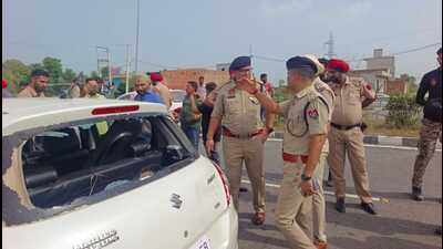 Cops at the site in Barnala where the Bambiha gang associates were arrested after a shootout on Wednesday. (HT Photo)