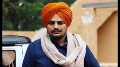 Nearly 12 months after the Punjab Police special investigation team (SIT) filed the first chargesheet against gangsters in Punjabi singer Sidhu Moose Wala’s murder case, the trial against 25 accused, including Lawrence Bishnoi and Jaggu Bhagwanpuria, started in the Mansa district and sessions court on Wednesday.
