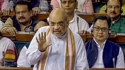 Union Home Minister Amit Shah participates in the discussion on the Motion of No-Confidence in the Lok Sabha during the Monsoon session of Parliament, in New Delhi, Wednesday. (PTI) Union Home Minister Amit Shah participates in the discussion on the Motion of No-Confidence in the Lok Sabha during the Monsoon session of Parliament, in New Delhi, Wednesday. (PTI)