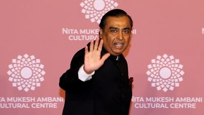 FILE PHOTO: Mukesh Ambani, Chairman of Reliance Industries, waves on the red carpet during the second day of the opening of Nita Mukesh Ambani Cultural Centre (NMACC) at Jio World Centre, in Mumbai, India, April 1, 2023. REUTERS/Niharika Kulkarni/File Photo (REUTERS)
