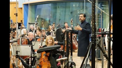 Ricky Kej conducting the 100-member Royal Philharmonic Orchestra at Abbey Road Studios Ricky Kej conducting the 100-member Royal Philharmonic Orchestra at Abbey Road Studios