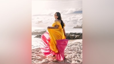 The ensemble also features frilled sleeves, a gathered pleated design, a flowy silhouette, a tiered hem, and a floor-sweeping hem length. (Instagram) The ensemble also features frilled sleeves, a gathered pleated design, a flowy silhouette, a tiered hem, and a floor-sweeping hem length. (Instagram)