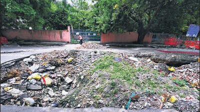 The cave-in has been temporarily filled with sand and debris to prevent accidents. (Sanchit Khanna/ HT Photo) The cave-in has been temporarily filled with sand and debris to prevent accidents. (Sanchit Khanna/ HT Photo)
