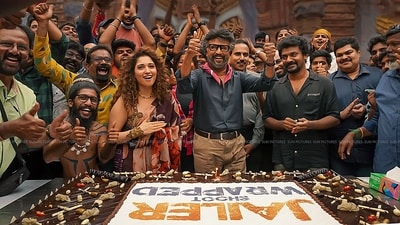 Actors Rajinikanth and Tamannaah Bhatia with director Nelson Dilipkumar celebrate after shooting for their upcoming movie Jailer wrapped up. (PTI) Actors Rajinikanth and Tamannaah Bhatia with director Nelson Dilipkumar celebrate after shooting for their upcoming movie Jailer wrapped up. (PTI)
