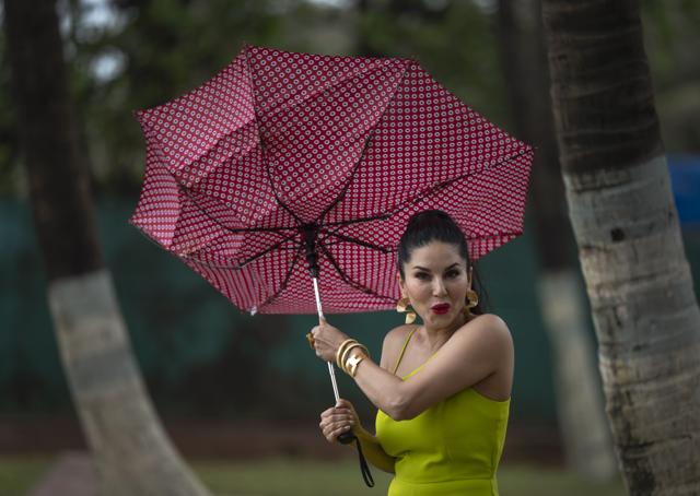 Sunny almost lost her umbrella courtesy the strong winds while we did this special shoot! (Photo by Satish Bate/ Hindustan Times) (Hindustan Times) Sunny almost lost her umbrella courtesy the strong winds while we did this special shoot! (Photo by Satish Bate/ Hindustan Times) (Hindustan Times)