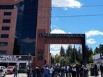 Members of the media outside the funeral home where the late presidential candidate Fernando Villavicencio's remains were taken in Quito, Ecuador, on Thursday, Aug. 10, 2023. (Photographer: Misha Vallejo/Bloomberg)