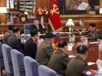 North Korean leader Kim Jong Un attends the 7th enlarged meeting of the 8th Central Military Commission of the Workers' Party of Korea.