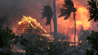 The hall of historic Waiola Church in Lahaina and nearby Lahaina Hongwanji Mission are engulfed in flames. (AP) The hall of historic Waiola Church in Lahaina and nearby Lahaina Hongwanji Mission are engulfed in flames. (AP)