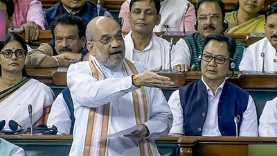 Union Home Minister Amit Shah speaks during a discussion on the No Confidence Motion in the Lok Sabha in the Monsoon Session of Parliament, in New Delhi on Wednesday. (ANI/Sansad TV) Union Home Minister Amit Shah speaks during a discussion on the No Confidence Motion in the Lok Sabha in the Monsoon Session of Parliament, in New Delhi on Wednesday. (ANI/Sansad TV)