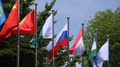 Flags flutter at the headquarters of the Shanghai Cooperation Organisation in Beijing on July 4, 2023. (AFP) Flags flutter at the headquarters of the Shanghai Cooperation Organisation in Beijing on July 4, 2023. (AFP)