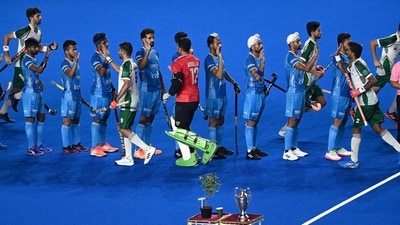 India and Pakistan players congratulate each other before their Asian Champions Trophy 2023 hockey tournament match at the Mayor Radhakrishnan Hockey Stadium in Chennai on August 9, 2023. (Photo by Satish BABU / AFP) (AFP) India and Pakistan players congratulate each other before their Asian Champions Trophy 2023 hockey tournament match at the Mayor Radhakrishnan Hockey Stadium in Chennai on August 9, 2023. (Photo by Satish BABU / AFP) (AFP)