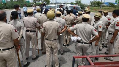 Haryana police personnel deployed at Sohna-Nuh road near Rojka Meo wake of communal violence in Gurugram on Wednesday (HT File Photo/Parveen Kumar)