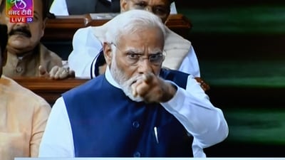 In this screen grab India's Prime Minister Narendra Modi (R) is seen on a television screen as he addresses the lower house Lok Sabha in New Delhi on August 10, 2023, in response to the Opposition's no-confidence motion against the NDA government. Dozens of opposition MPs walked out of India's parliament on August 10 as Prime Minister Narendra Modi was defending his record at the climax of a three-day no-confidence debate, television images showed. (Photo by ARUN SANKAR / AFP) (AFP) In this screen grab India's Prime Minister Narendra Modi (R) is seen on a television screen as he addresses the lower house Lok Sabha in New Delhi on August 10, 2023, in response to the Opposition's no-confidence motion against the NDA government. Dozens of opposition MPs walked out of India's parliament on August 10 as Prime Minister Narendra Modi was defending his record at the climax of a three-day no-confidence debate, television images showed. (Photo by ARUN SANKAR / AFP) (AFP)