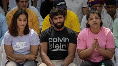 Indian wrestlers Vinesh Phogat, Bajrang Punia, and Sakshi Malik (REUTERS)