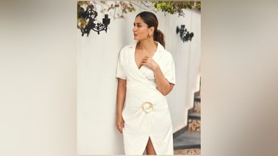 Kareena accessorised the ensemble with minimal yet striking double-hoop earrings and olive green-coloured embellished pumps with killer high heels. (Instagram) Kareena accessorised the ensemble with minimal yet striking double-hoop earrings and olive green-coloured embellished pumps with killer high heels. (Instagram)