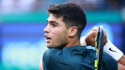 Carlos Alcaraz of Spain hits a shot against Ben Shelton of the United States (Getty Images via AFP) Carlos Alcaraz of Spain hits a shot against Ben Shelton of the United States (Getty Images via AFP)