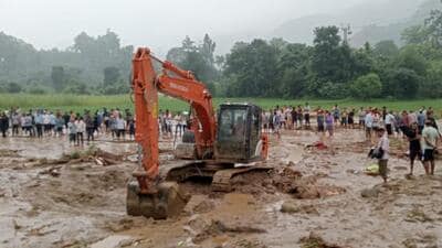 Rescue teams clearing the sludge after a cloudburst in Sirmaur on Wednesday. (HT Photo) Rescue teams clearing the sludge after a cloudburst in Sirmaur on Wednesday. (HT Photo)