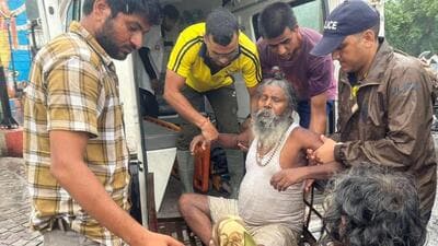 SDRF rescue a Sadhu trapped under rubble after wall collapse in Rishkesh (HT Photo)