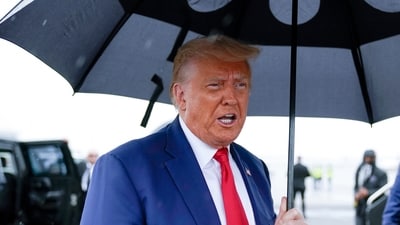 FILE - Former President Donald Trump speaks before he boards his plane at Ronald Reagan Washington National Airport, Aug. 3, 2023, in Arlington, Va.  Special counsel Jack Smith’s team obtained a search warrant in January for records related to former President Donald Trump’s Twitter account, and a judge levied a $350,000 fine on the company for missing the deadline to company. That’s according to court documents released Wednesday.  (AP Photo/Alex Brandon, File) (AP)