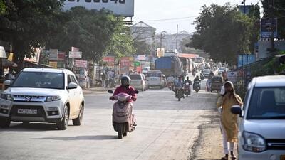 With authorities not heeding to their repeated demands to repair the road passing through their area, the villagers of Bhugaon Gram Panchayat have concretised the stretch in their locality through crowdfunding. (KALPESH NUKTE/HT) With authorities not heeding to their repeated demands to repair the road passing through their area, the villagers of Bhugaon Gram Panchayat have concretised the stretch in their locality through crowdfunding. (KALPESH NUKTE/HT)