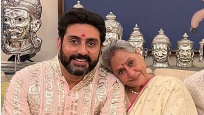 Jaya Bachchan and Abhishek Bachchan pose together. Jaya Bachchan and Abhishek Bachchan pose together.