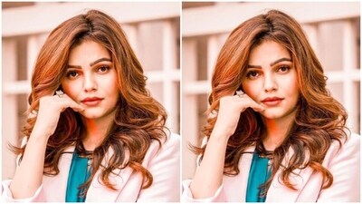 Rubina wore her tresses open in wavy curls with a middle part and decked up in nude eyeshadow, mascara-laden eyelashes, drawn eyebrows, contoured cheeks and a shade of red lipstick. (Instagram/@rubinadilaik) Rubina wore her tresses open in wavy curls with a middle part and decked up in nude eyeshadow, mascara-laden eyelashes, drawn eyebrows, contoured cheeks and a shade of red lipstick. (Instagram/@rubinadilaik)