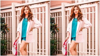Rubina looked drool-worthy in a long blue top with a closed neckline, teamed with a matching pair of blue satin shorts and a pastel pink oversized blazer. (Instagram/@rubinadilaik) Rubina looked drool-worthy in a long blue top with a closed neckline, teamed with a matching pair of blue satin shorts and a pastel pink oversized blazer. (Instagram/@rubinadilaik)