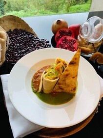 A fusion dish combining soft chawal crepes filled with paneer and paired with flavorful rajma curry, served alongside green chutney and a papad crisp for a delightful meal. (Chef Abhishek Kulshrestha) A fusion dish combining soft chawal crepes filled with paneer and paired with flavorful rajma curry, served alongside green chutney and a papad crisp for a delightful meal. (Chef Abhishek Kulshrestha)