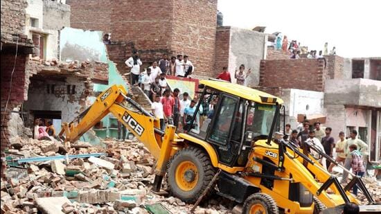 On Wednesday, railway authorities, along with the local police and administration, removed alleged encroachment at Nai Basti (HT Photo)