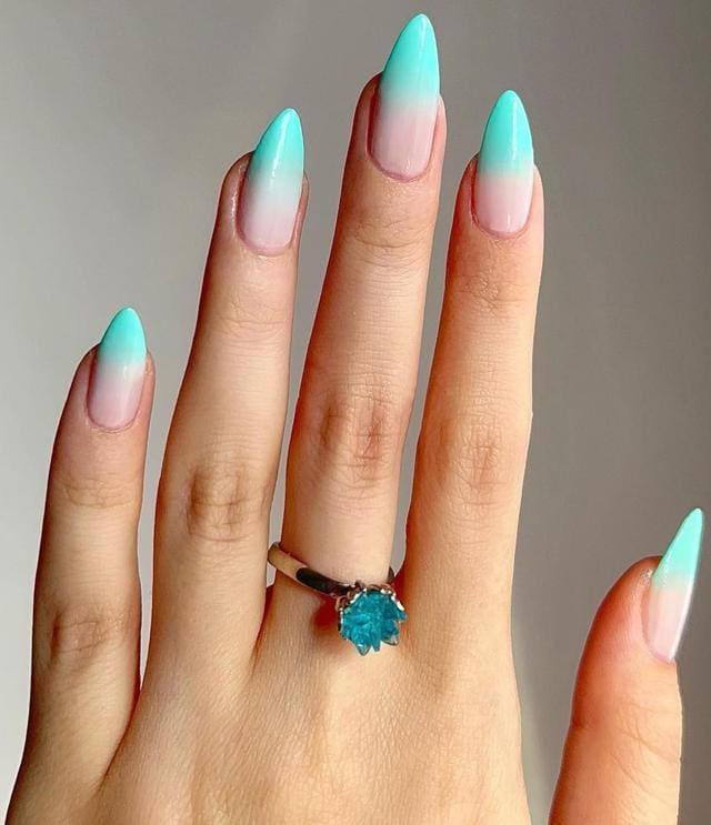 For a vibrant pop on your nails, try ombre colours in blue For a vibrant pop on your nails, try ombre colours in blue