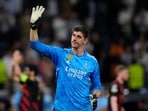 Real Madrid's goalkeeper Thibaut Courtois waves to fans at the end of a 2023 Champions League semifinal Real Madrid's goalkeeper Thibaut Courtois waves to fans at the end of a 2023 Champions League semifinal