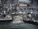TOPSHOT - An aerial image taken on August 10, 2023 shows destroyed homes and buildings on the waterfront burned to the ground in Lahaina in the aftermath of wildfires in western Maui, Hawaii. At least 36 people have died after a fast-moving wildfire turned Lahaina to ashes, officials said August 9, 2023 as visitors asked to leave the island of Maui found themselves stranded at the airport. The fires began burning early August 8, scorching thousands of acres and putting homes, businesses and 35,000 lives at risk on Maui, the Hawaii Emergency Management Agency said in a statement. TOPSHOT - An aerial image taken on August 10, 2023 shows destroyed homes and buildings on the waterfront burned to the ground in Lahaina in the aftermath of wildfires in western Maui, Hawaii. At least 36 people have died after a fast-moving wildfire turned Lahaina to ashes, officials said August 9, 2023 as visitors asked to leave the island of Maui found themselves stranded at the airport. The fires began burning early August 8, scorching thousands of acres and putting homes, businesses and 35,000 lives at risk on Maui, the Hawaii Emergency Management Agency said in a statement.