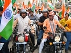 Union ministers Anurag Thakur and Kishan Reddy during 'Har Ghar Tiranga' bike rally in Delhi on Friday.