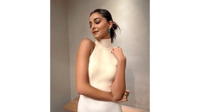 Ananya's white dress is from the shelves of the designer clothing label Alex Perry. She styled it with jewels and footwear from Diamantina and Jimmy Choo.&nbsp; (Instagram)