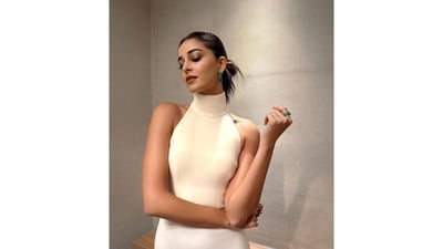 Ananya accessorised the ensemble with striking emerald hoop earrings, matching statement rings, and platform pumps with gold chain embellishment on the front.&nbsp; (Instagram)