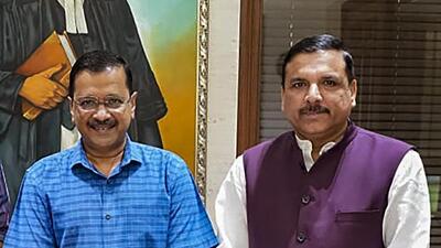 Delhi Chief Minister Arvind Kejriwal and AAP leader Sanjay Singh (PTI/)