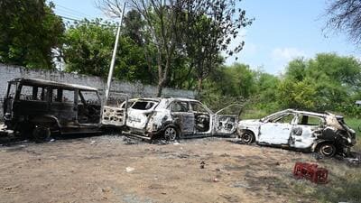 Gurugram, India-August 01, 2023: A group of miscreants pelted stones on the cyber crime police station and set fire several vehicles during the communal violence in Nuh, District Mewat, in Gurugram, India, on Tuesday, 01 August 2023. (Photo by Parveen Kumar/Hindustan Times) Gurugram, India-August 01, 2023: A group of miscreants pelted stones on the cyber crime police station and set fire several vehicles during the communal violence in Nuh, District Mewat, in Gurugram, India, on Tuesday, 01 August 2023. (Photo by Parveen Kumar/Hindustan Times)